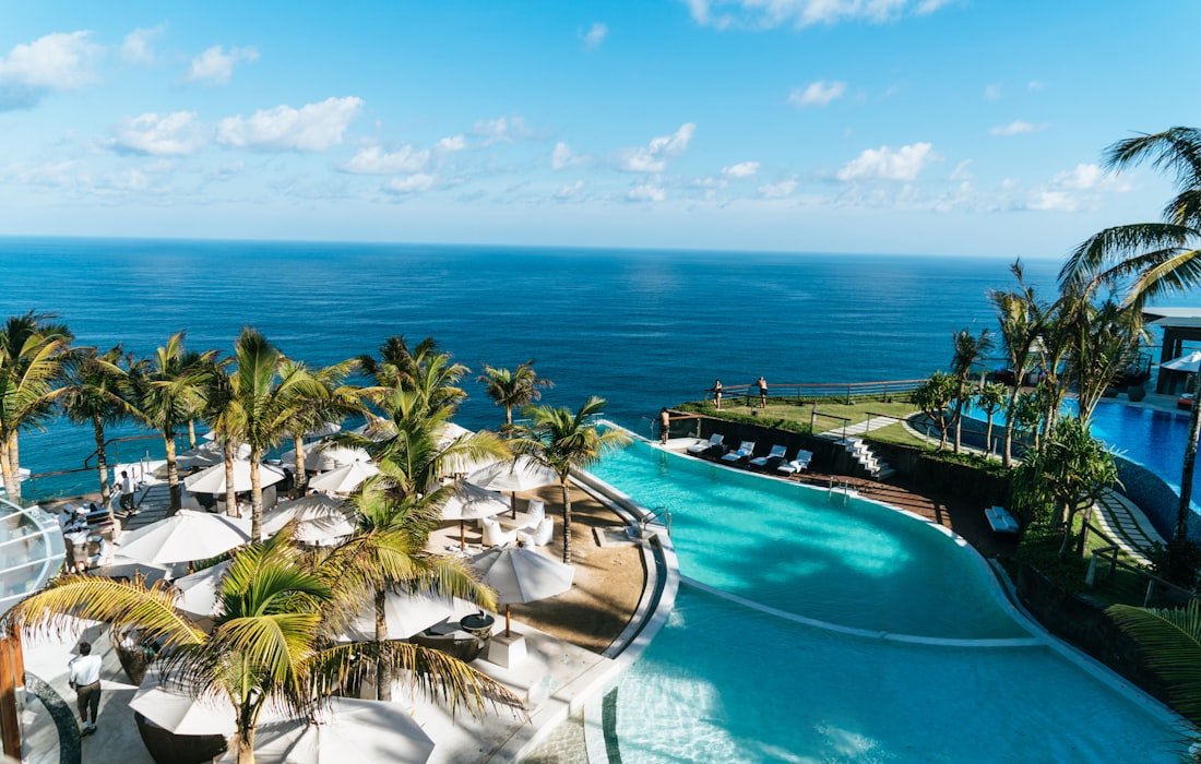 An infinity pool overlooking the ocean at a luxury resort